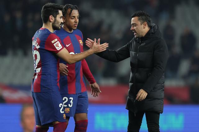 1709549376832088294.jpg gundogan xavi.jpg